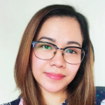 Portrait of Veven, a Filipino USRN nurse, smiling confidently.